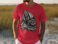 Red t-shirt with praying hands, rosary, rose, and 