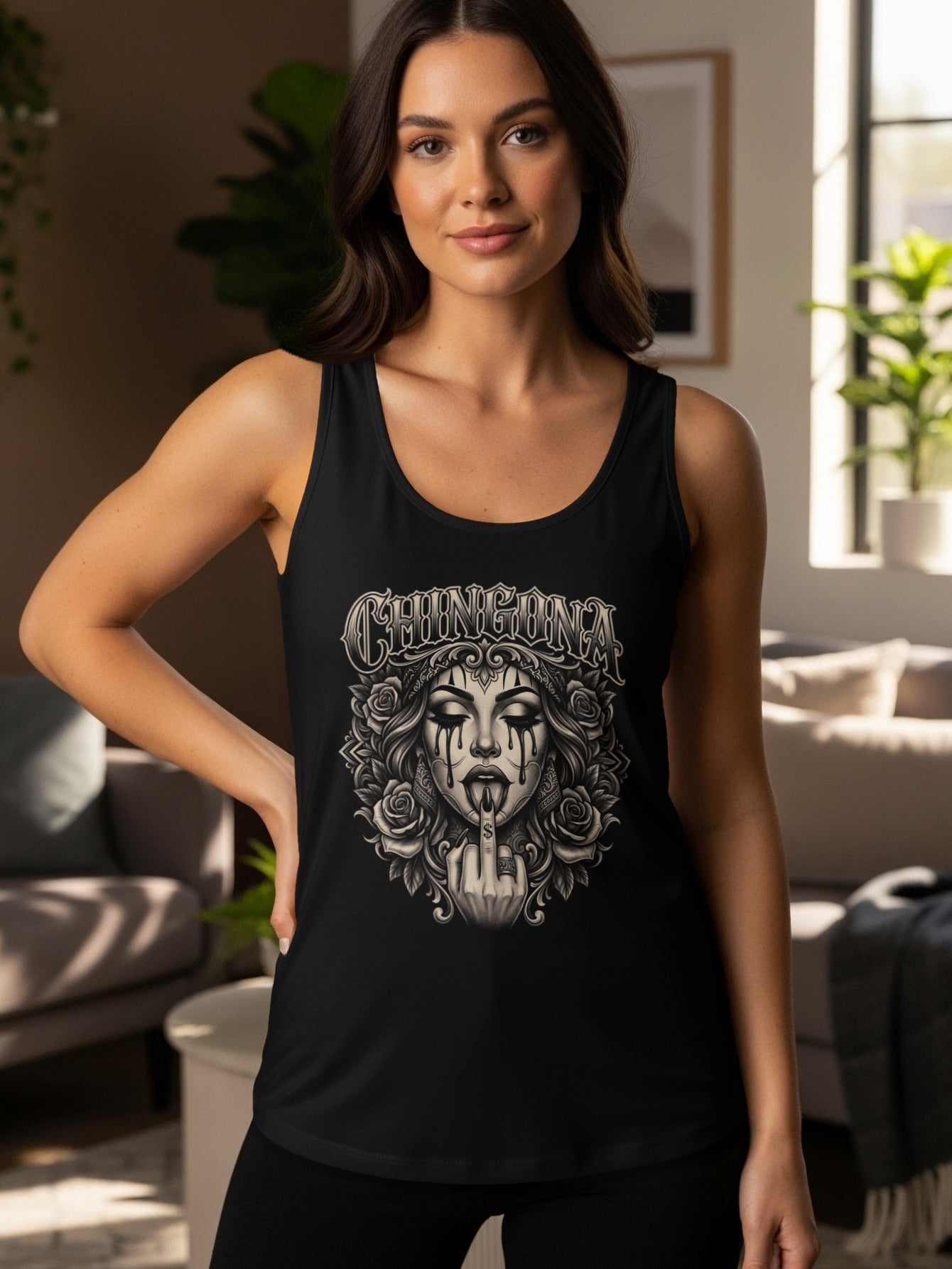 Black tank top featuring a distressed skull design with roses and middle finger.