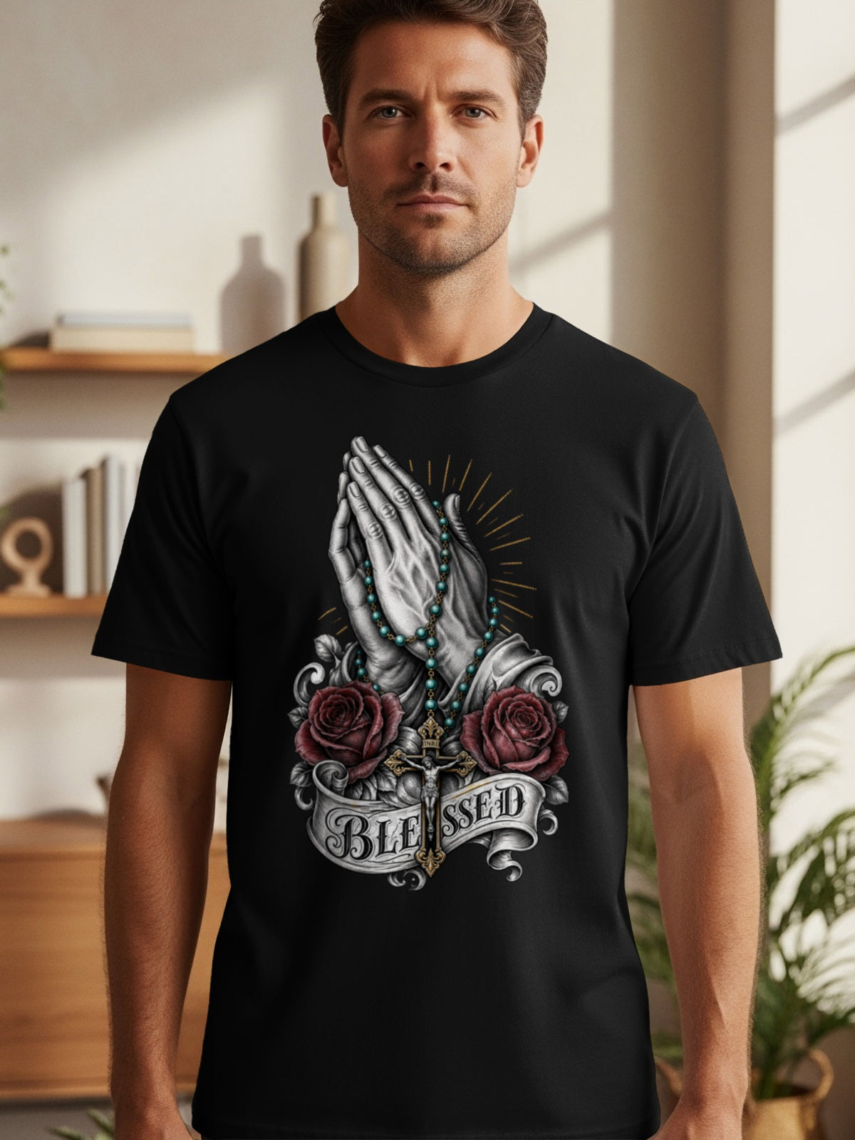 Black t-shirt with praying hands, roses, rosary, crucifix, and the word BLESSED.