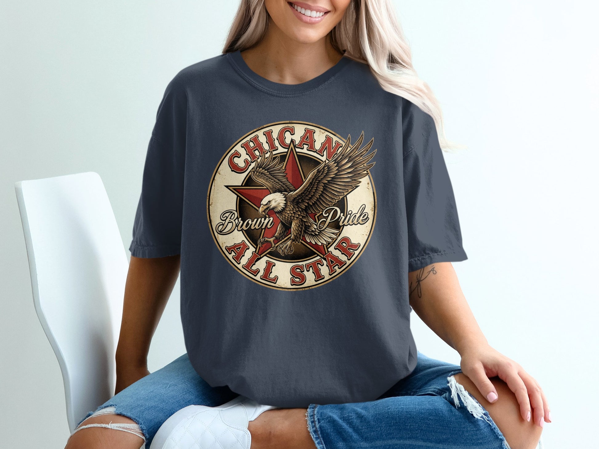 Dark t-shirt with "Chicano Brown All Star" text and eagle graphic.
