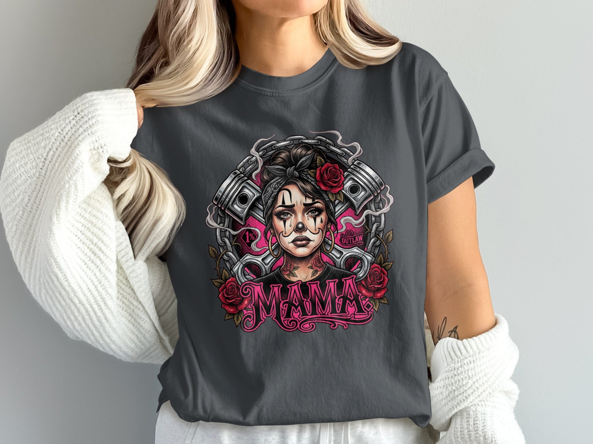 Tattoo-style portrait with roses and pistons, "Mama" text, on a dark grey t-shirt.