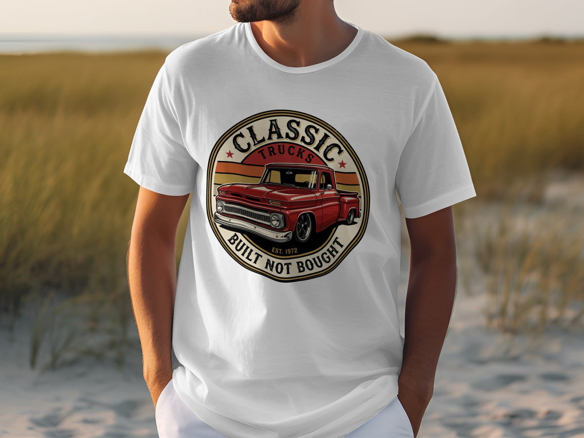 White t-shirt with graphic of red classic truck and text "Classic Trucks Built Not Bought Est. 1972".