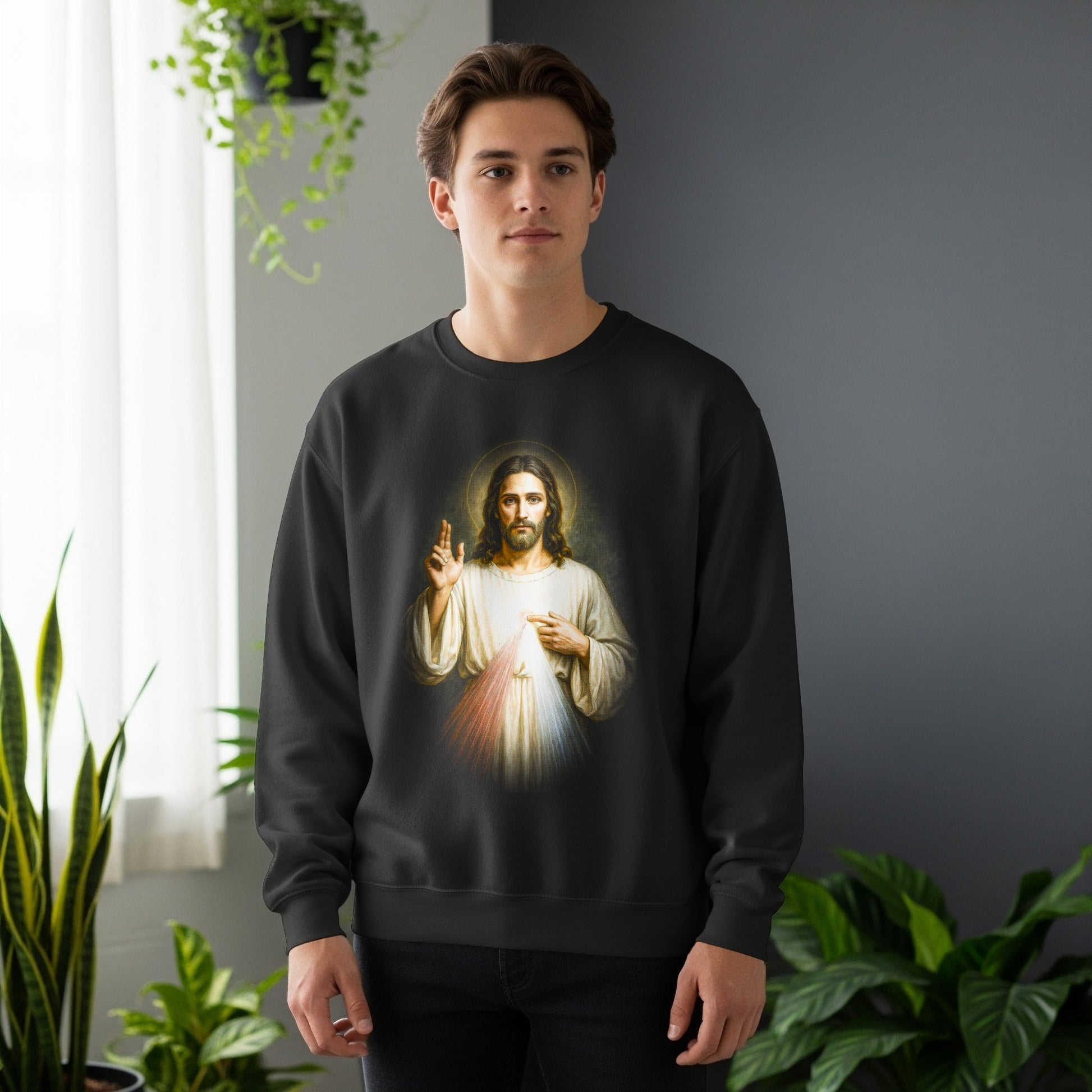 Black sweatshirt featuring Jesus with halo and outstretched hand.