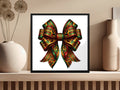 Ornate Kente cloth bow in a black frame on a shelf.
