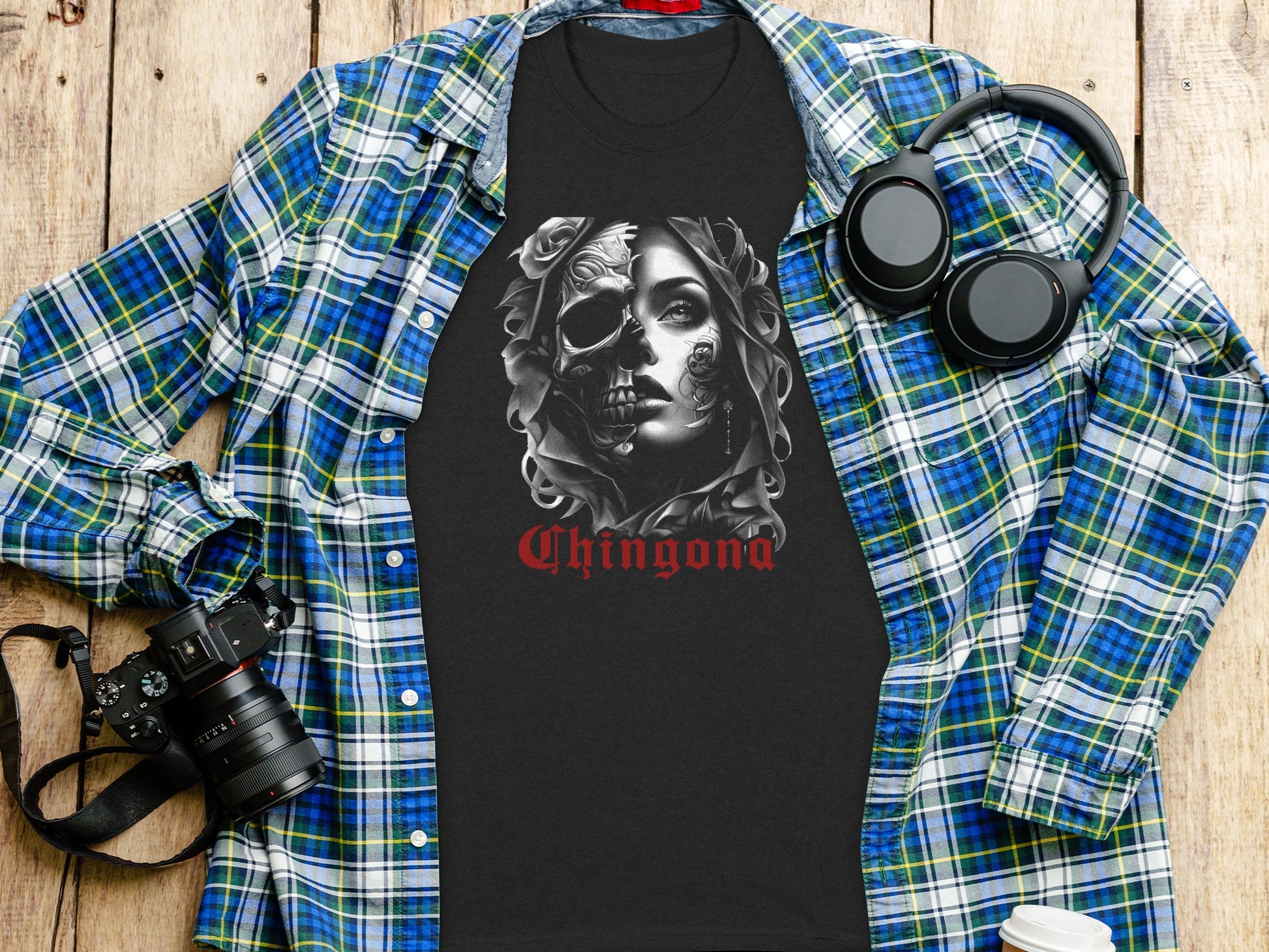 Black t-shirt with a skull and rose design and the word "Chingona".
