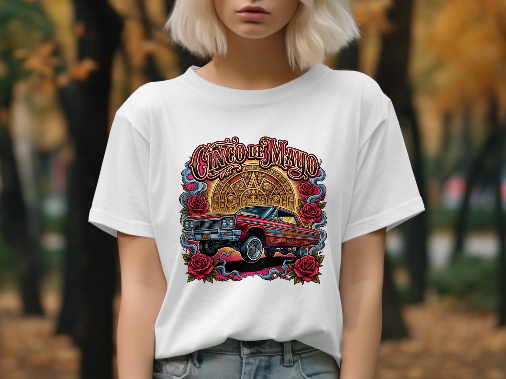 Red classic lowrider car and "Cinco de Mayo" text on a white t-shirt.