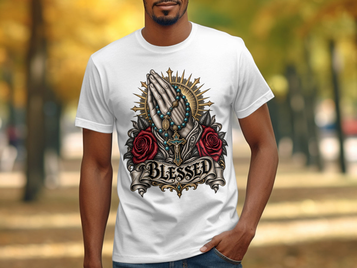 White t-shirt with praying hands, rosary, roses, and the word "BLESSED".