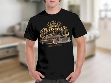 Black t-shirt with gold lowrider car and "Lowrider Tradition" text design.