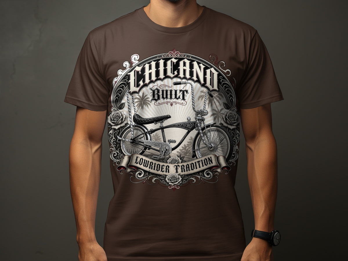 Brown t-shirt with "Chicano Built" and a lowrider bicycle graphic.