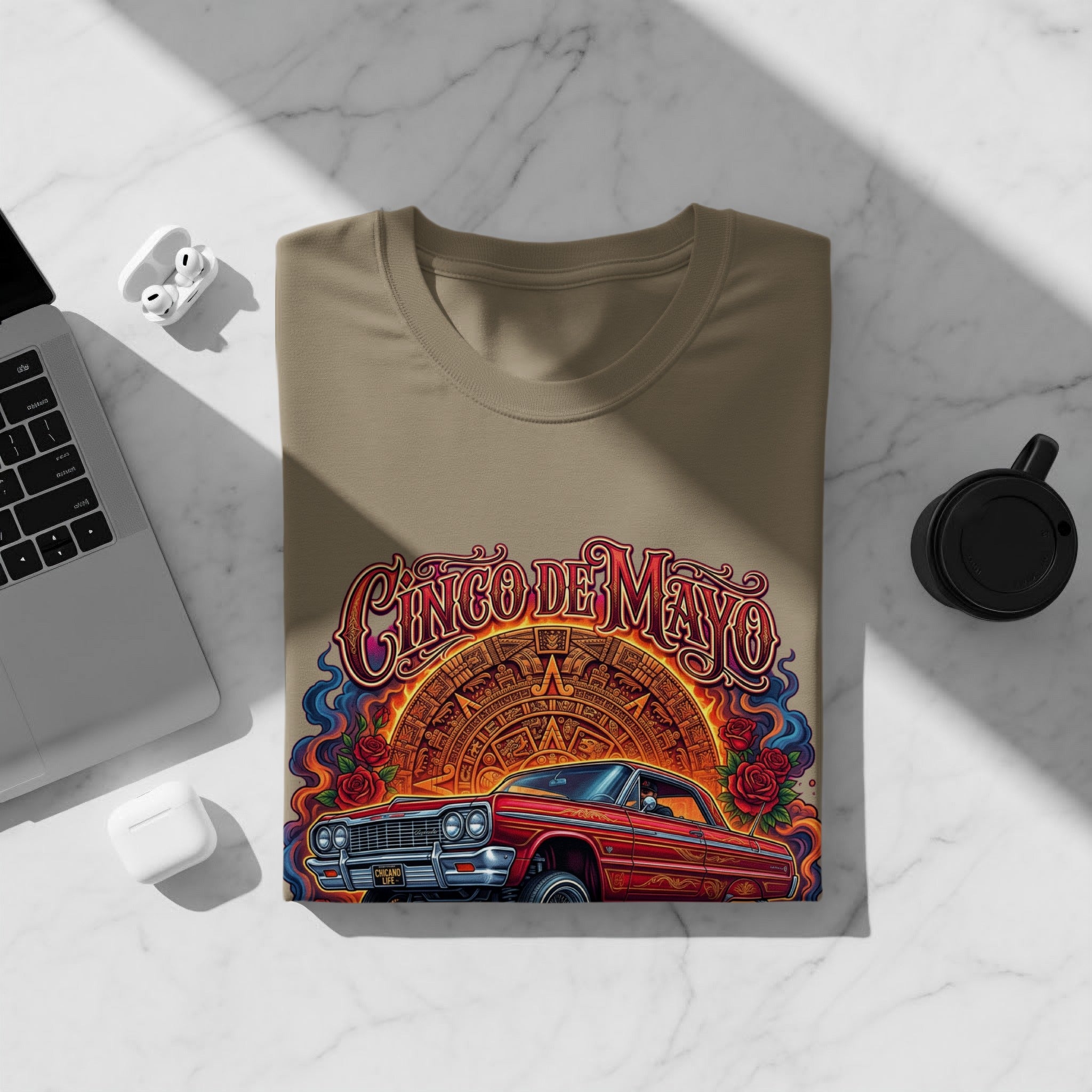 T-shirt with "Cinco de Mayo" text, red lowrider car, and roses.
