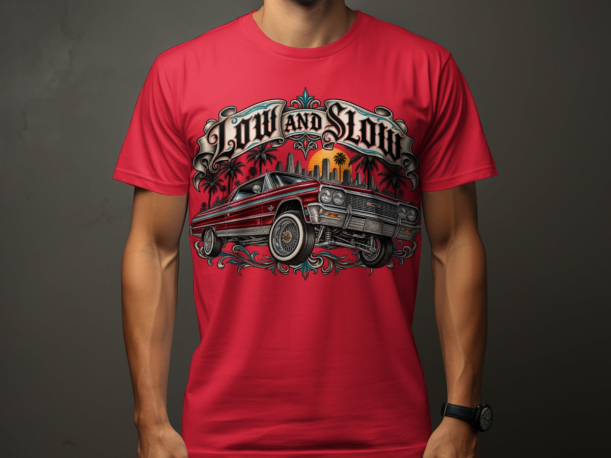 Red t-shirt featuring a lowrider car with "LOW AND SLOW" text, palm trees, and cityscape.