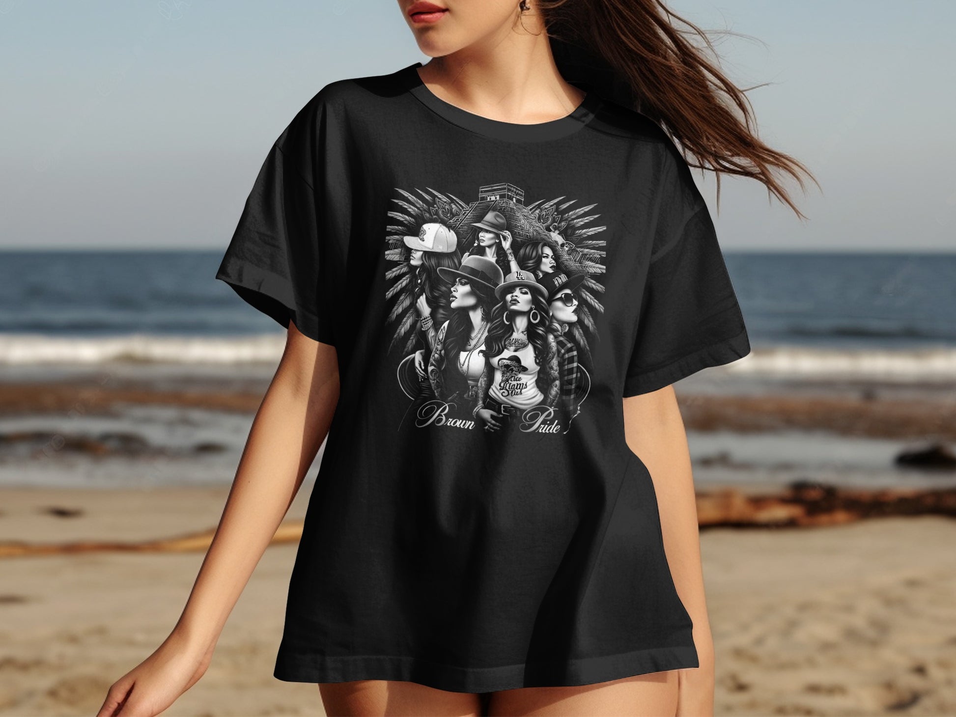 Black t-shirt with stylized artwork of women and "Brown Pride" text.