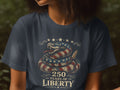 Navy t-shirt with coiled snake graphic, stars, and text 