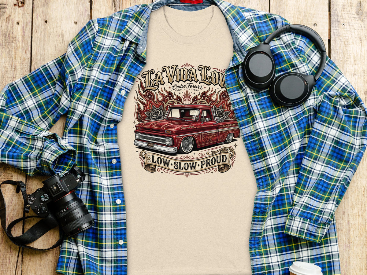 T-shirt with red lowrider truck and flames graphic, "LA VIDA LOW" text.