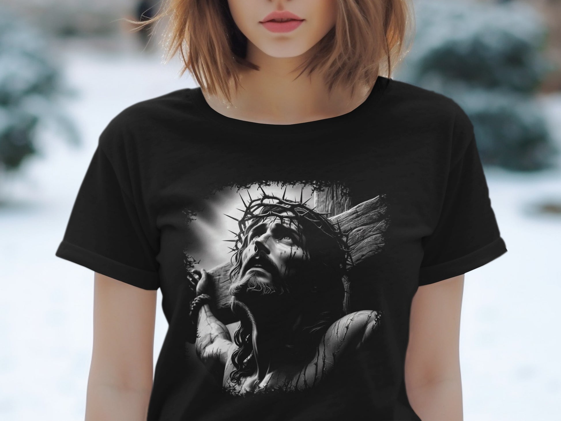 Black t-shirt featuring a black and white graphic of Jesus Christ on the cross.