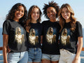 Four young women wear matching t-shirts featuring Jesus with hands clasped.