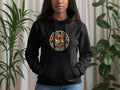 Black hoodie with circular graphic of a skeleton wearing sunglasses and a hat.