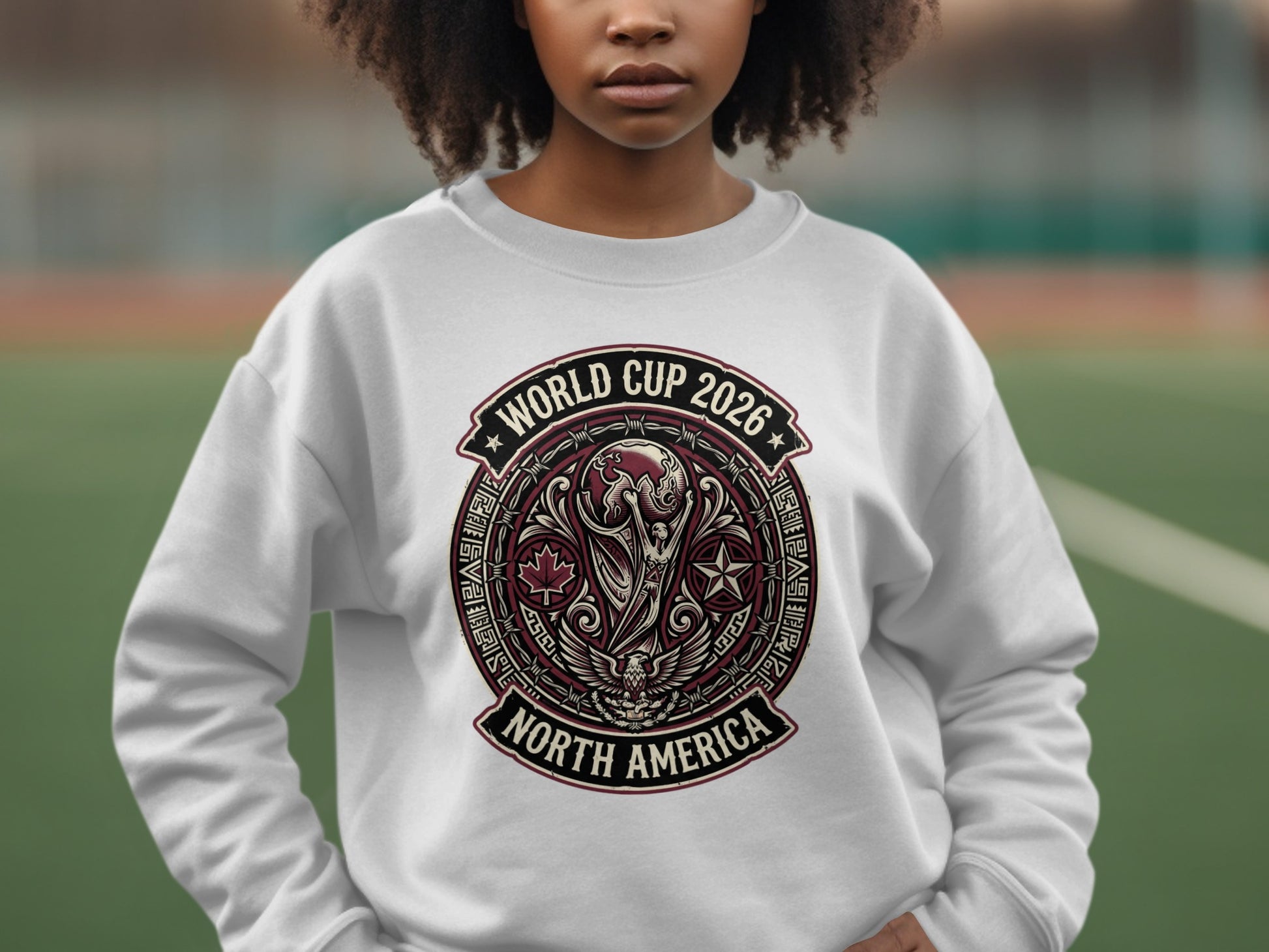 White sweatshirt featuring the FIFA World Cup 2026 North America logo.