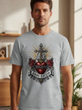 Grey t-shirt with a graphic of a Sacred Heart, cross, roses, and 
