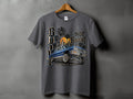 Grey t-shirt with a graphic of a blue lowrider car, palm trees, city skyline, and text.