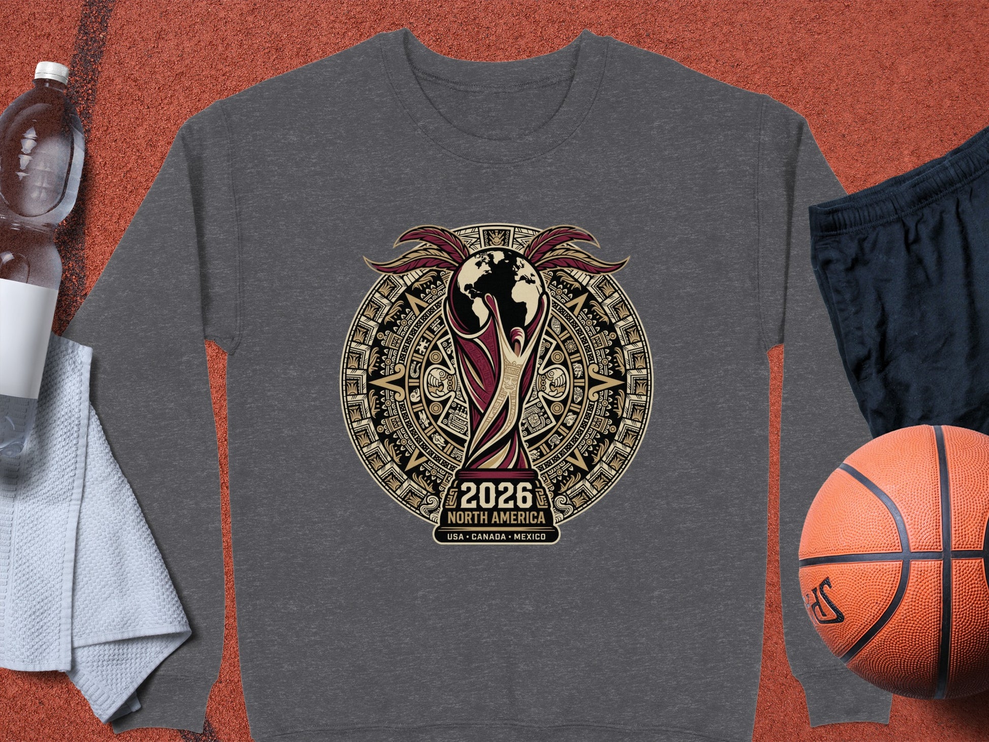 2026 North America World Cup logo on gray sweatshirt with sports accessories.