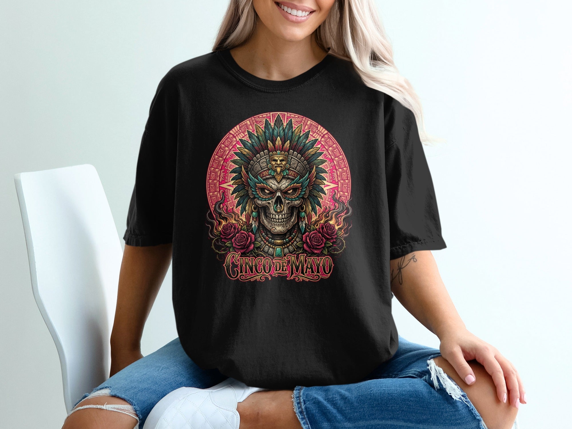 Black t-shirt with a colorful skull and roses design for Cinco de Mayo.