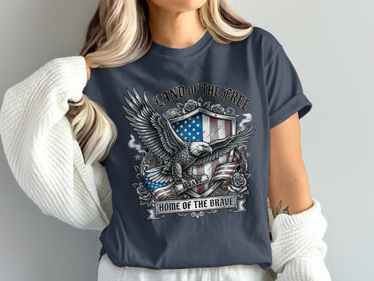 Shield with eagle, flag, and text "Land of the Free, Home of the Brave".