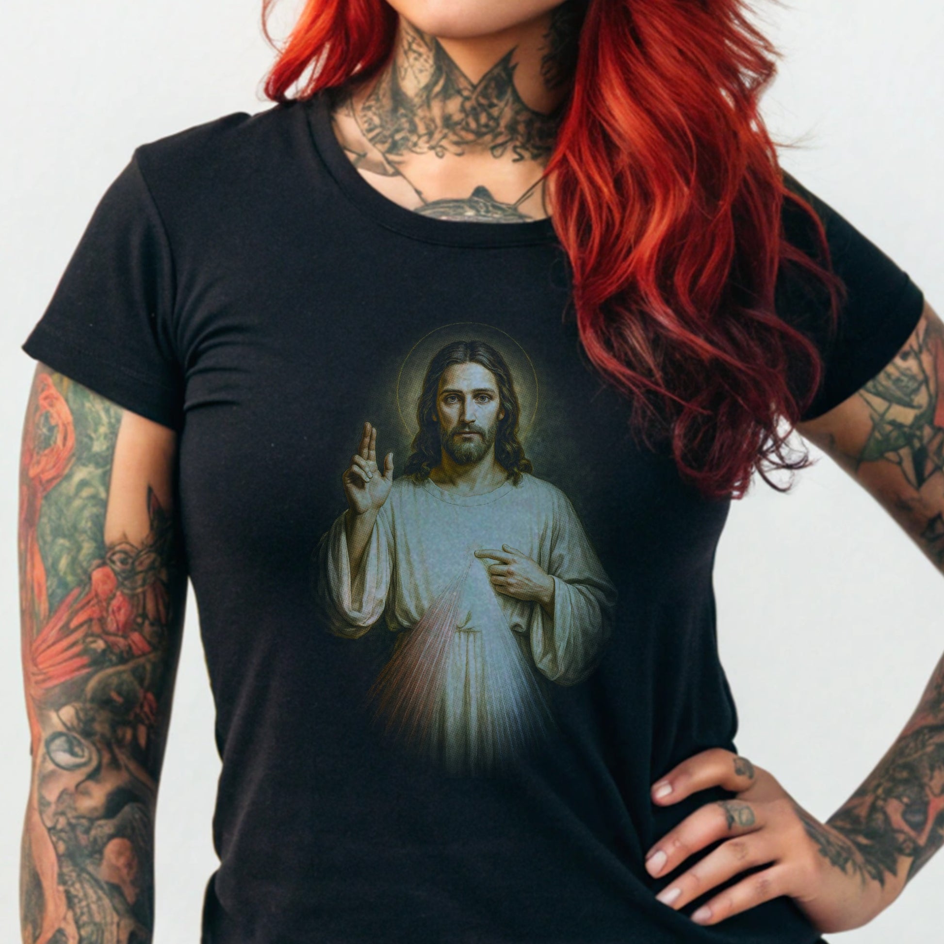 Black t-shirt with a Jesus Christ graphic on the chest.