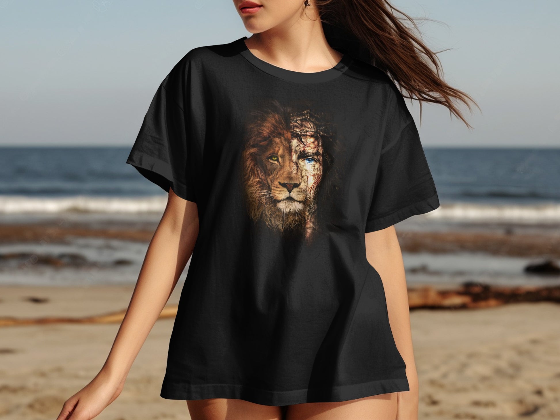 Black t-shirt with a lion's face splitting into a human face.