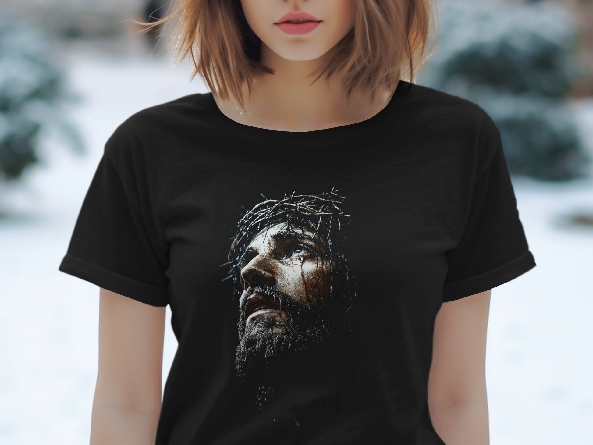 Black t-shirt featuring a close-up of Jesus with a crown of thorns.