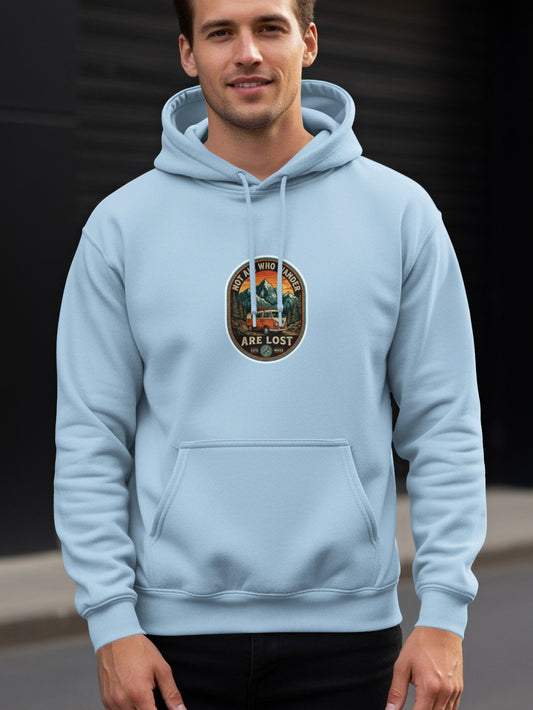 Light blue hoodie with "Not all who wander are lost" patch.