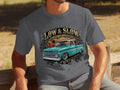 Graphic t-shirt with a teal vintage truck and 
