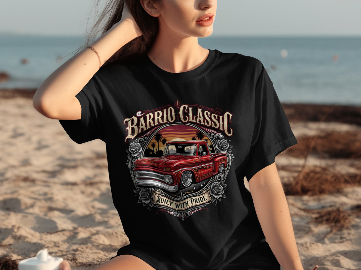 Black t-shirt with "Barrio Classic Built With Pride" text and red truck graphic.