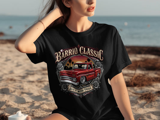 Black t-shirt with "Barrio Classic Built With Pride" text and red truck graphic.